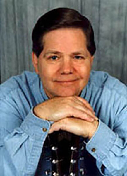 Wayne Hamilton portrait with guitar Wayne Hamilton portrait with guitar